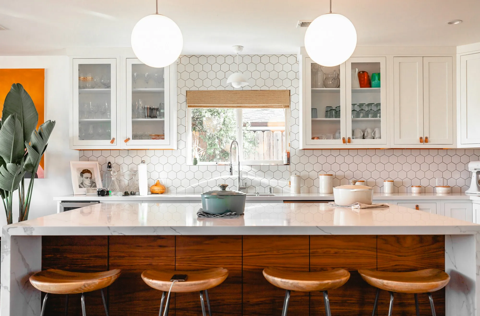 A bright kitchen with pendant lighting